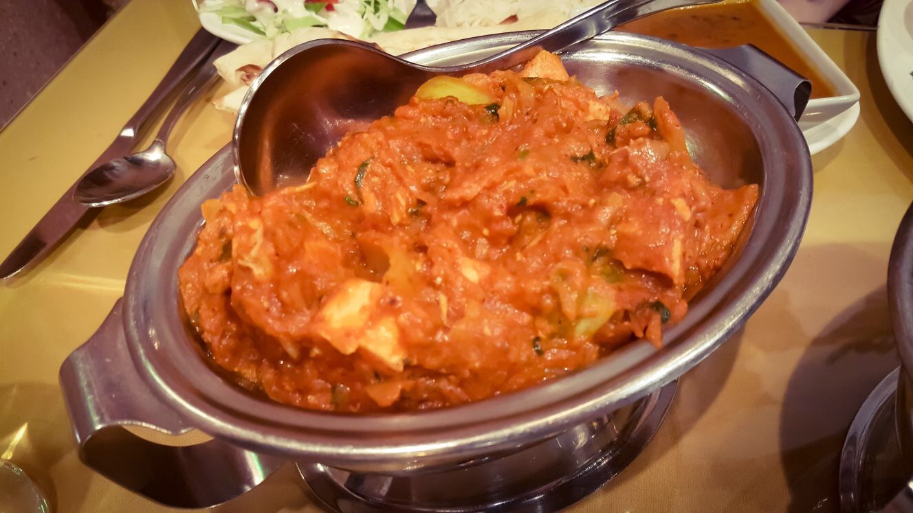 Handi Cuisine Chicken Tikka Masala served on a simmering pot
