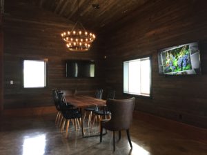 a photo of the cozy tasting table area of Vanessa Vineyard